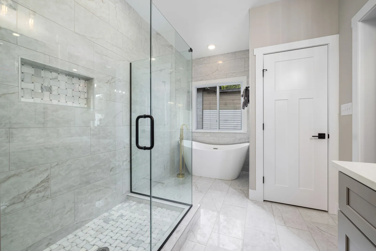 Finished bathroom renovation with walk-in shower in Ilford